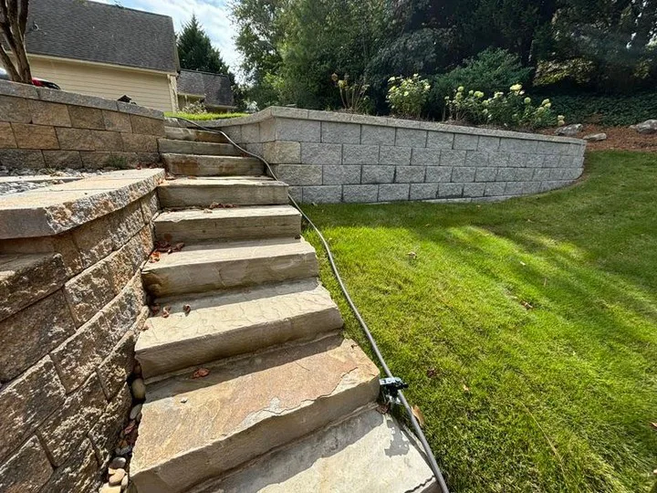 Workers looking at the design layout